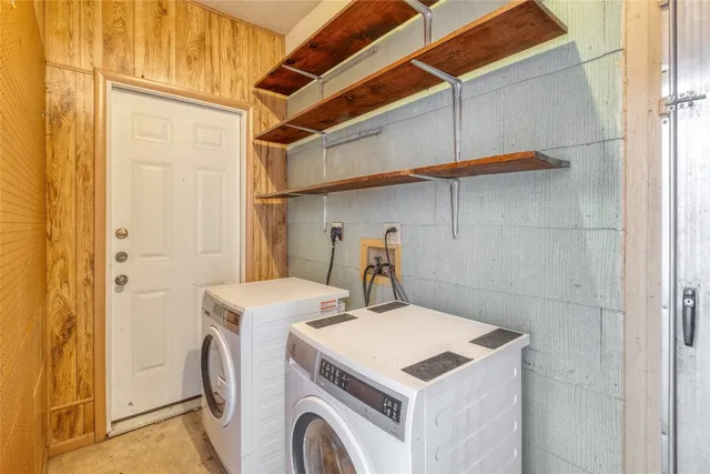 a utility room with dryer and washer