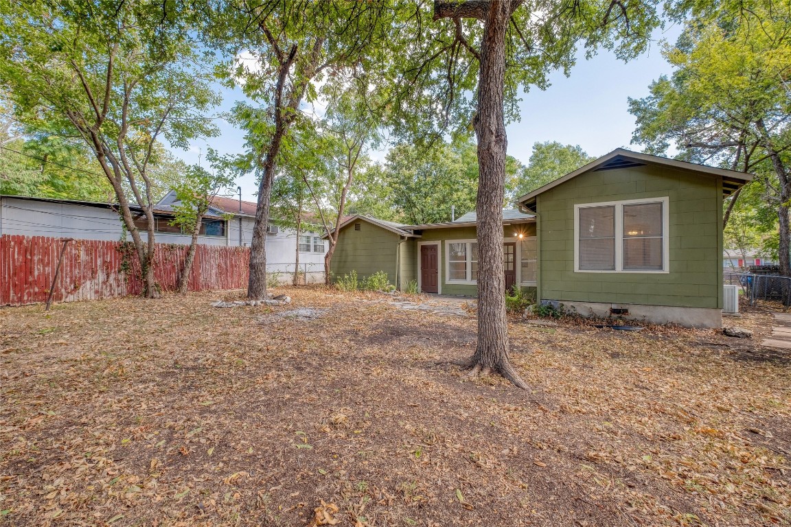 611 Genard Street Austin, TX 78751 - Photo 23 of 26 a view of a house with a yard and large tree