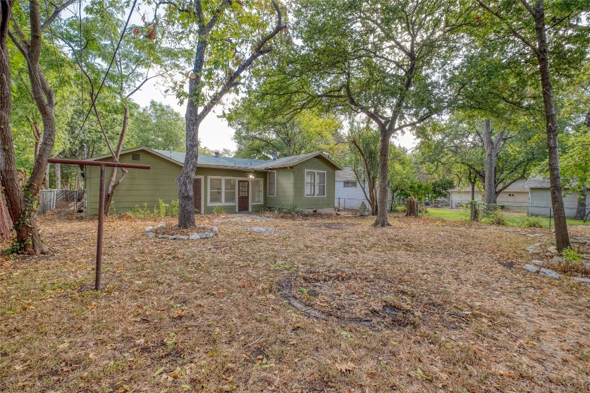 611 Genard Street Austin, TX 78751 - Photo 25 of 26 a view of a house with a backyard