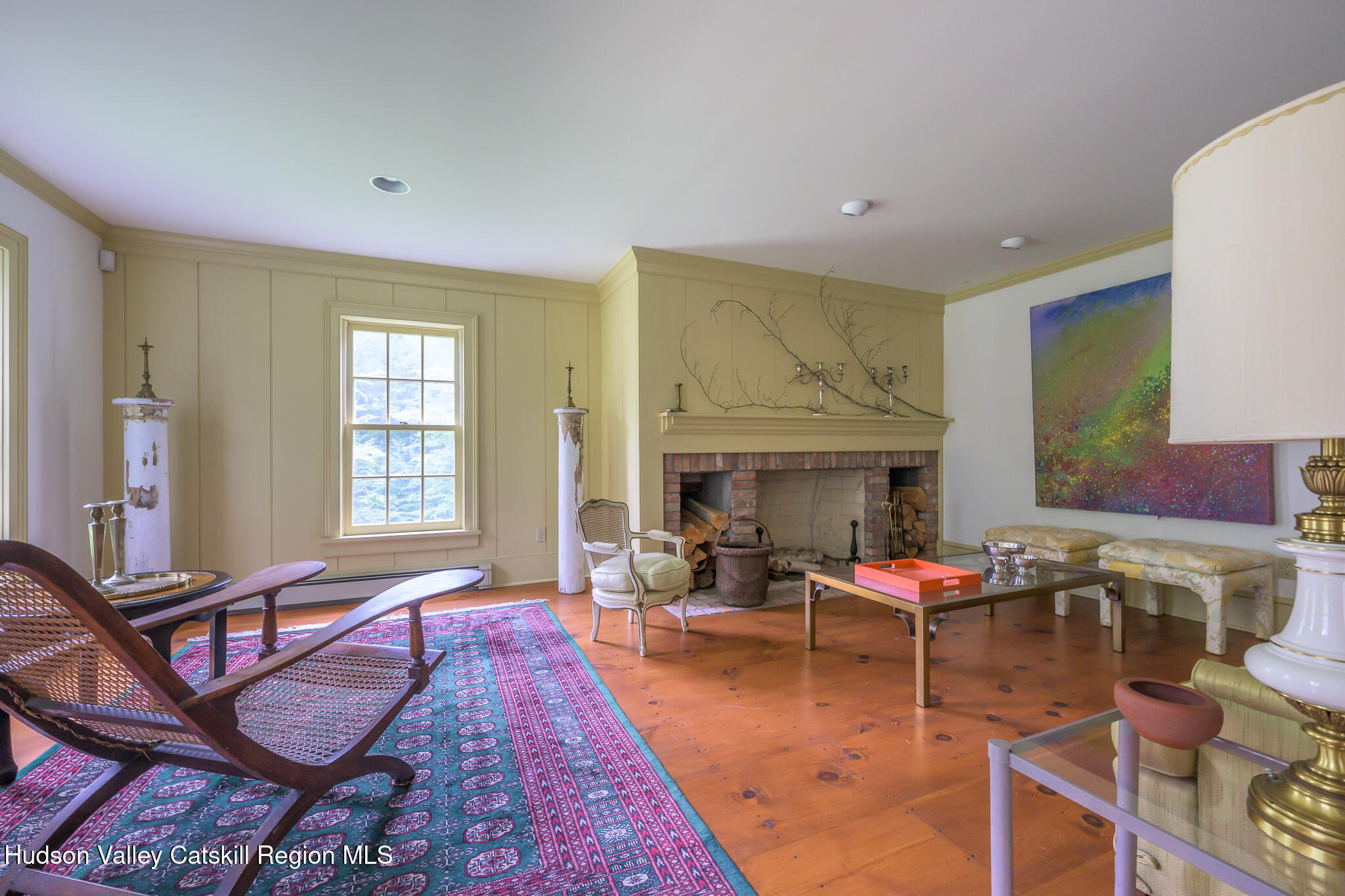 7 Partridge Drive Austerlitz, NY 12017 - Photo 14 of 46 a living room with furniture a fireplace and a table