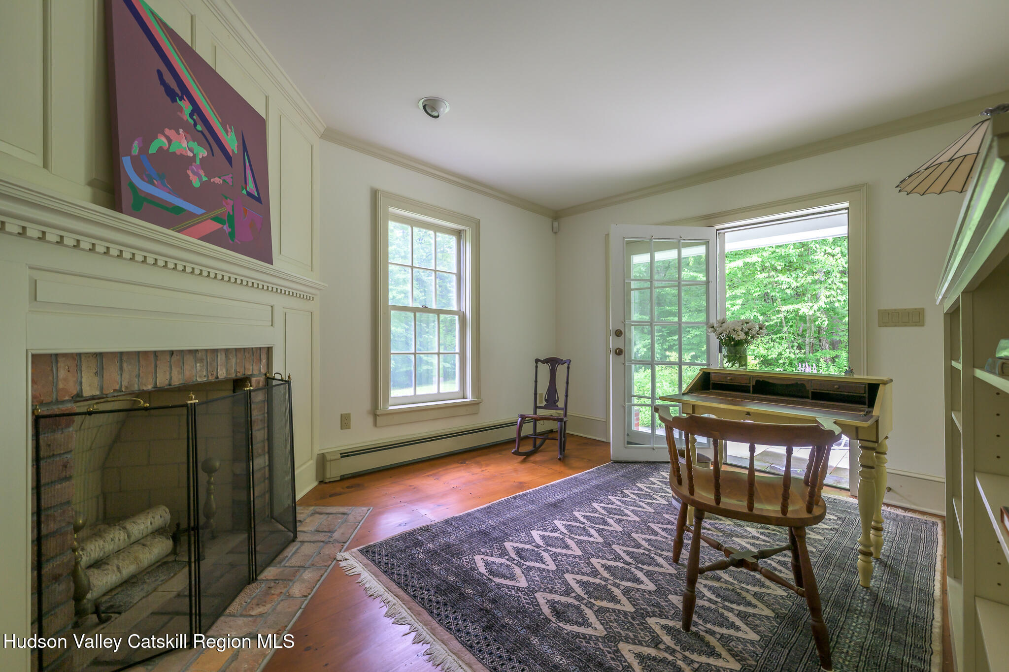 7 Partridge Drive Austerlitz, NY 12017 - Photo 20 of 46 a living room with furniture and a fireplace