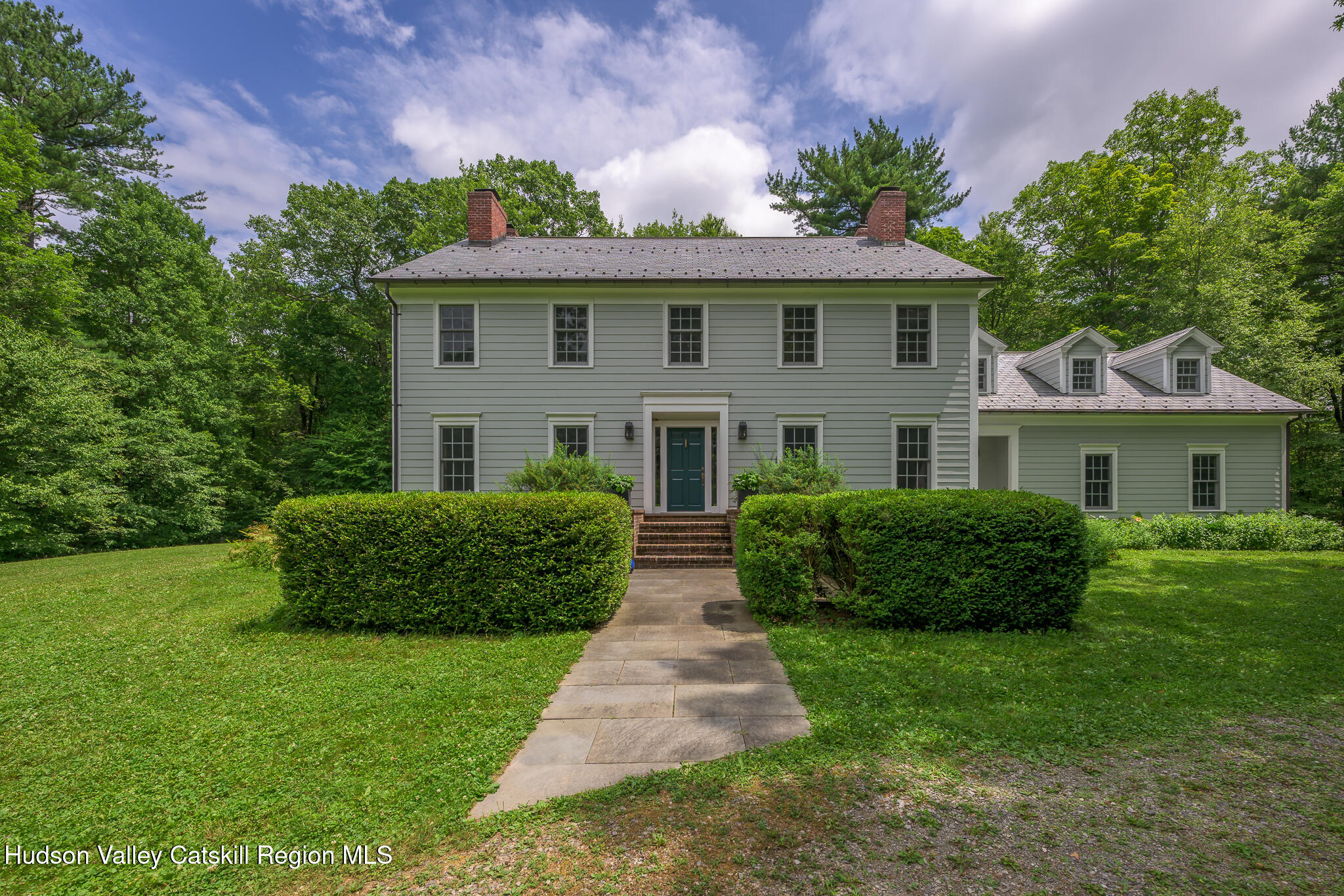 7 Partridge Drive Austerlitz, NY 12017 - Photo 2 of 46 a front view of a house with a garden