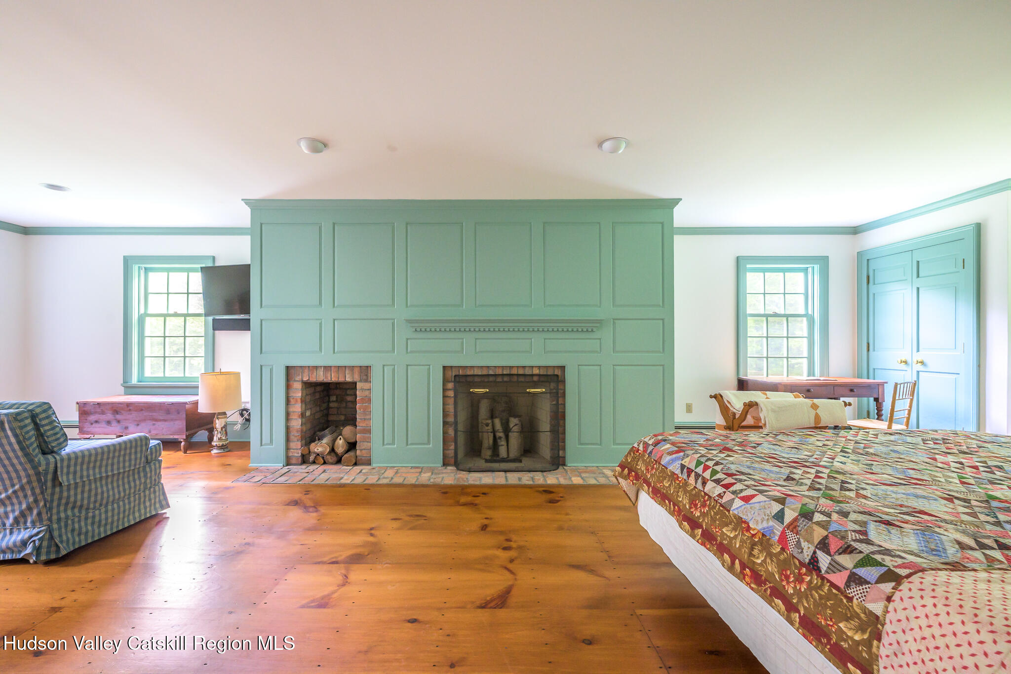 7 Partridge Drive Austerlitz, NY 12017 - Photo 29 of 46 a bedroom with a large bed and a couch