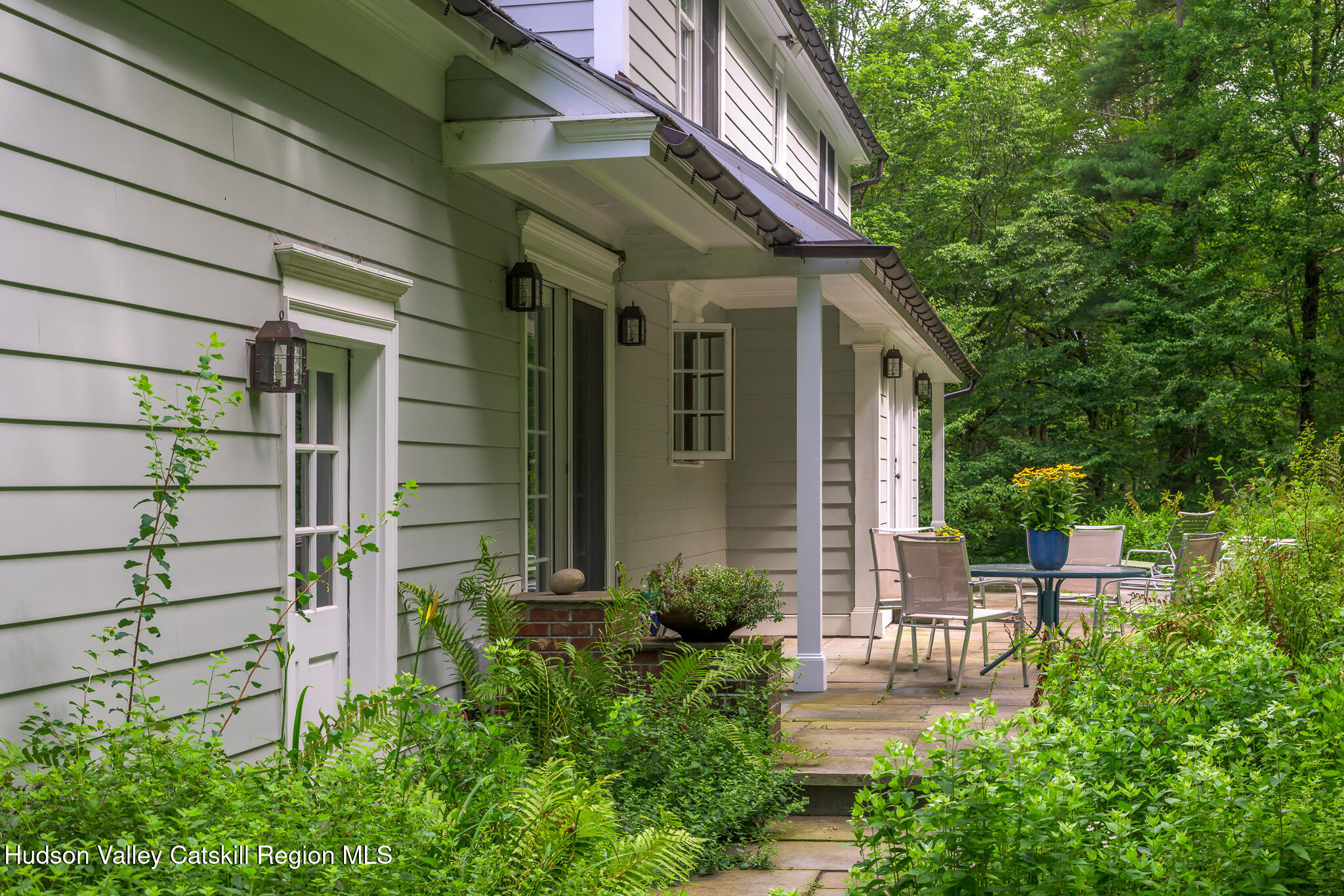7 Partridge Drive Austerlitz, NY 12017 - Photo 39 of 46 a view of a chair and table in the patio with plants