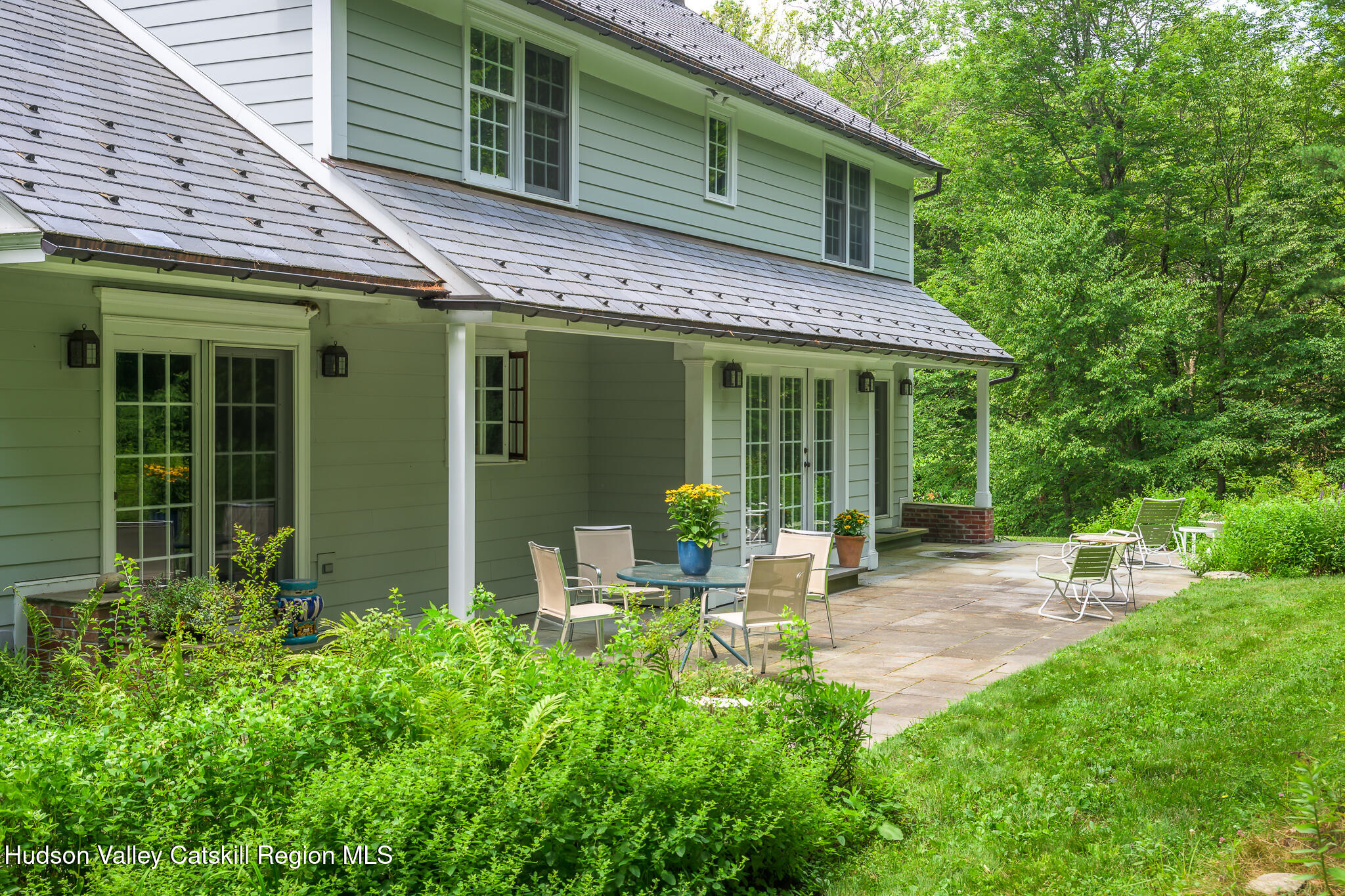 7 Partridge Drive Austerlitz, NY 12017 - Photo 8 of 46 a view of a house with backyard porch and sitting area