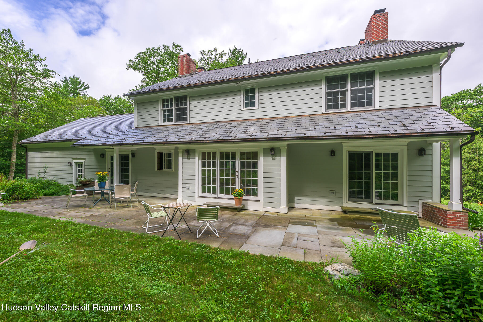 7 Partridge Drive Austerlitz, NY 12017 - Photo 9 of 46 a front view of a house with patio and garden