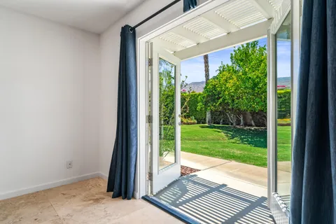 a house view with a garden space