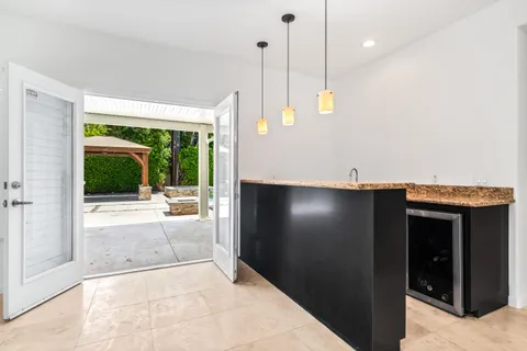 a view of a hallway with a porch