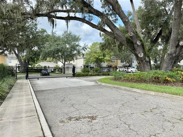 a front view of a house with swimming pool