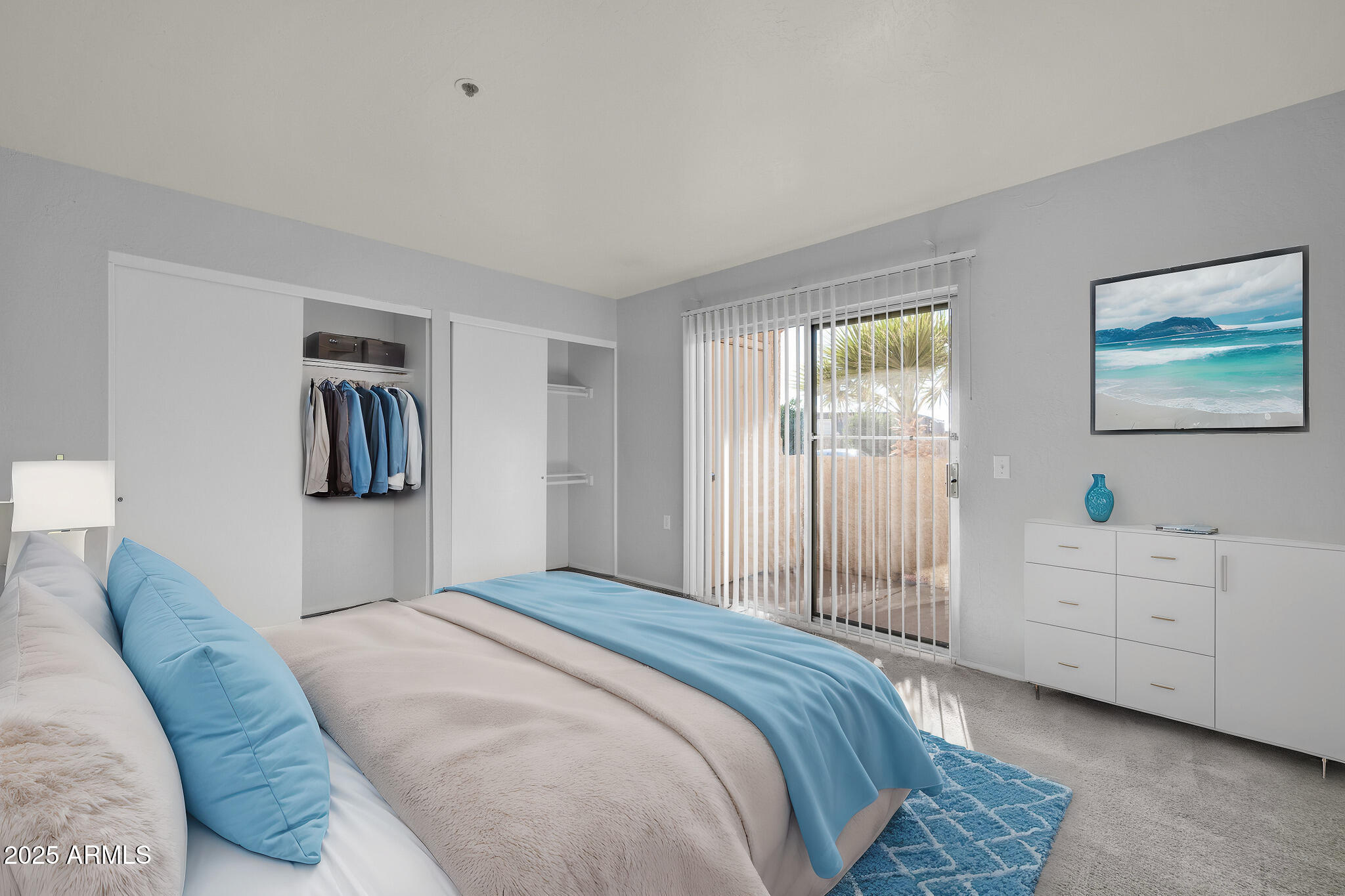 12221 West Bell Road, Unit 187 Surprise, AZ 85378 - Photo 4 of 11 a bedroom with furniture and windows
