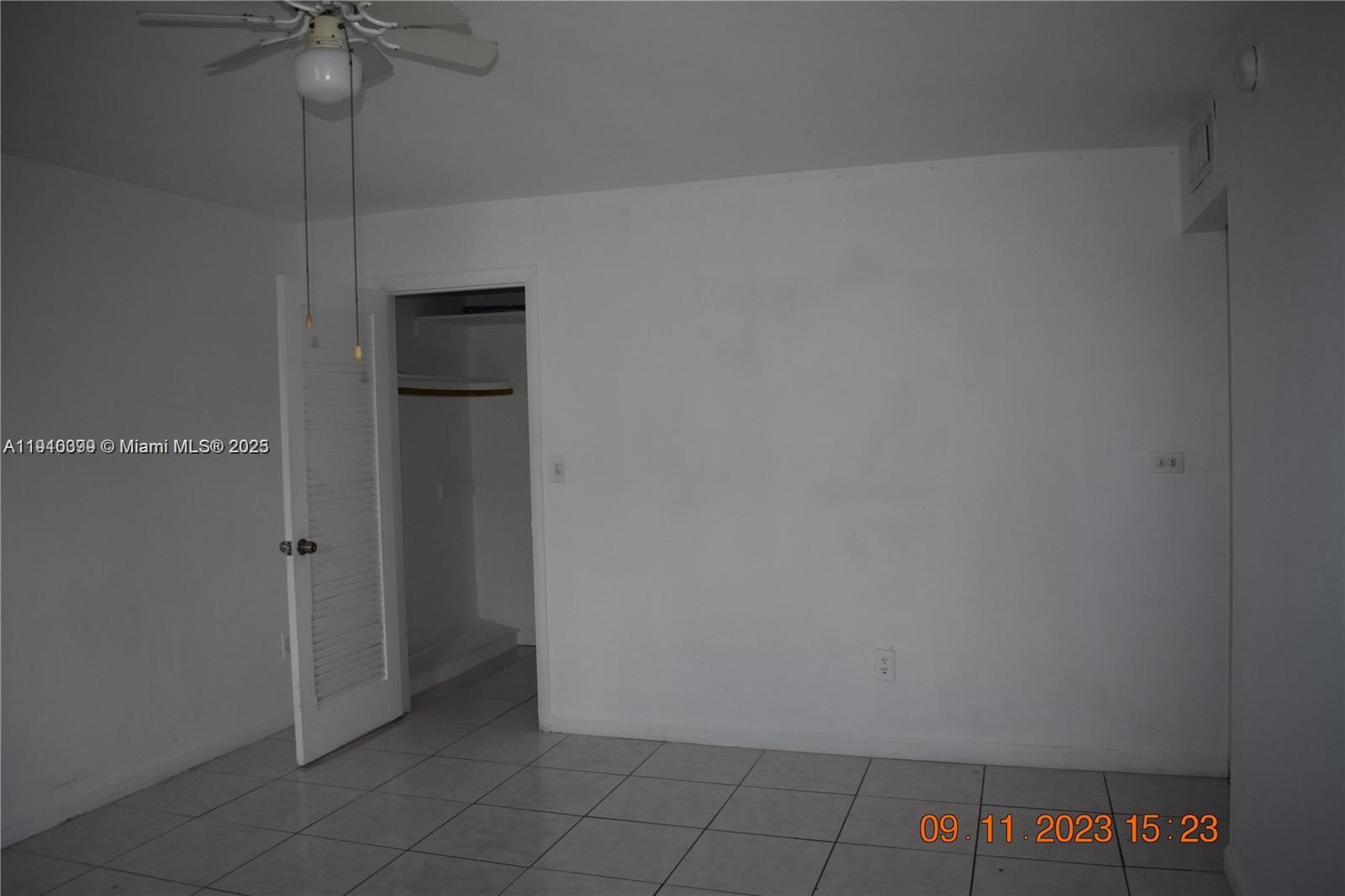 1885 Northeast 121st Street, Unit 23 North Miami, FL 33181 - Photo 14 of 22 a view of an empty room