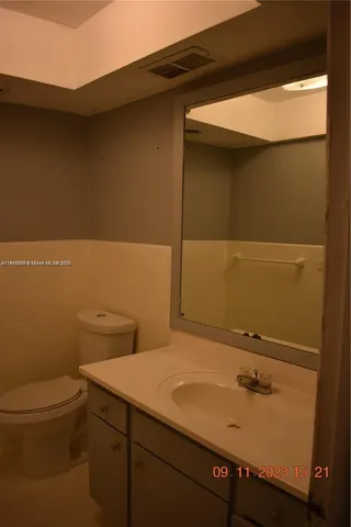 a bathroom with a sink and a toilet