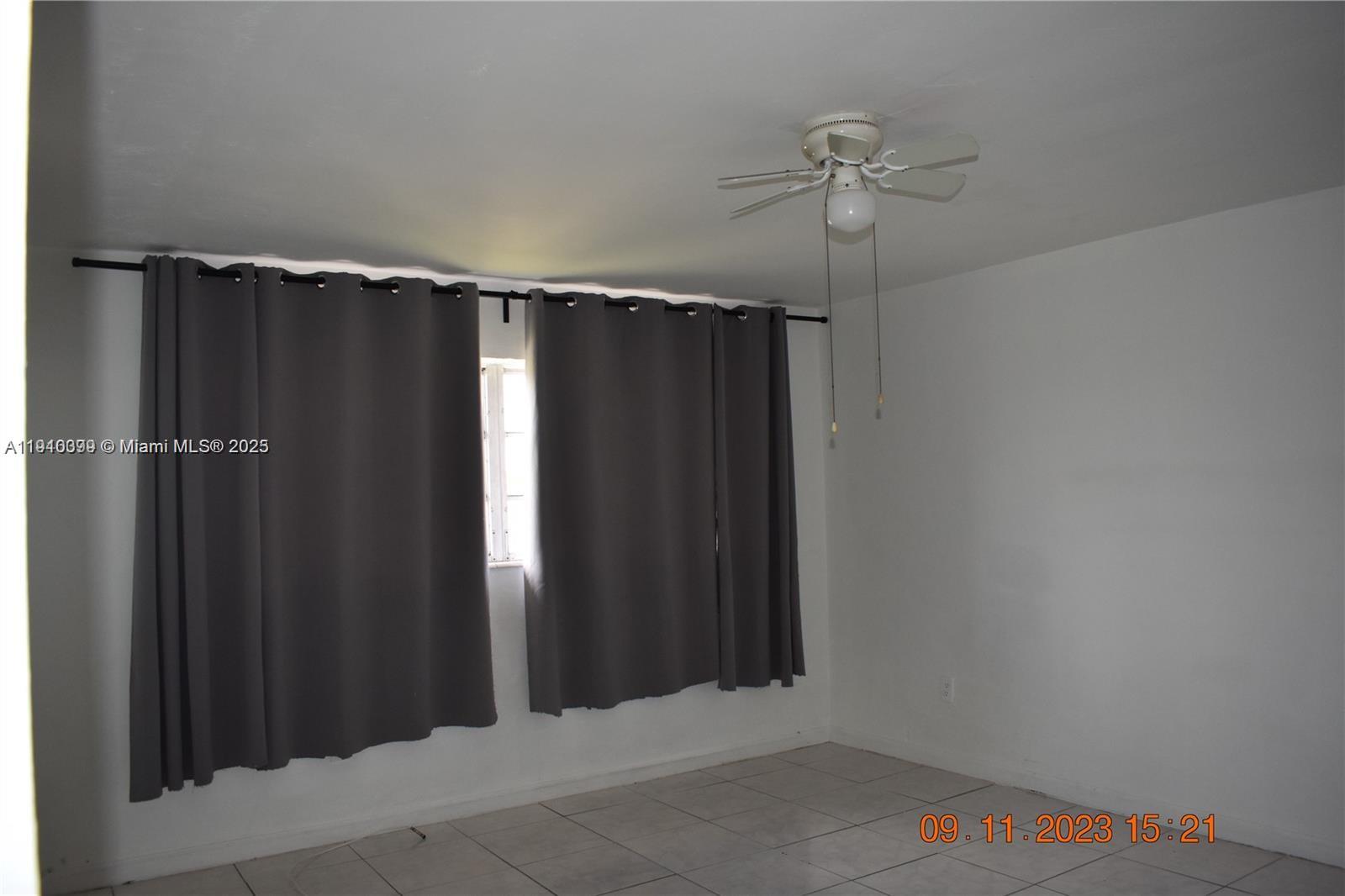 1885 Northeast 121st Street, Unit 23 North Miami, FL 33181 - Photo 10 of 22 a view of a closet