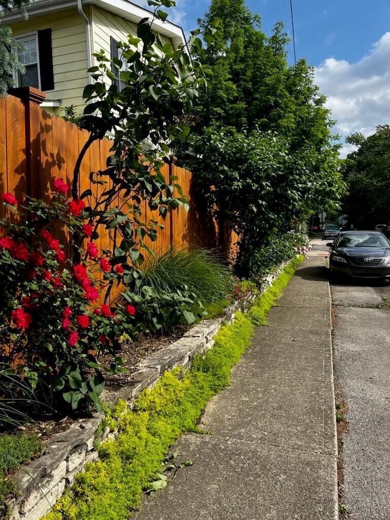 278 Crestview Road Columbus, OH 43202 - Photo 40 of 50 Summer view of the thoughtful plantings along the fence line.