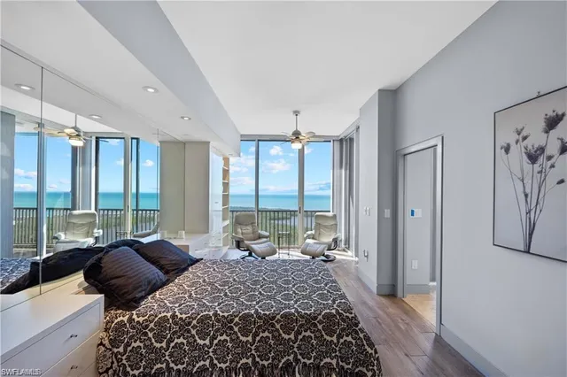 a bed room with a bed and a couch