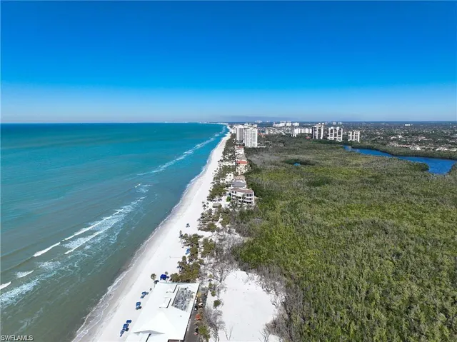 a view of a lake with a yard