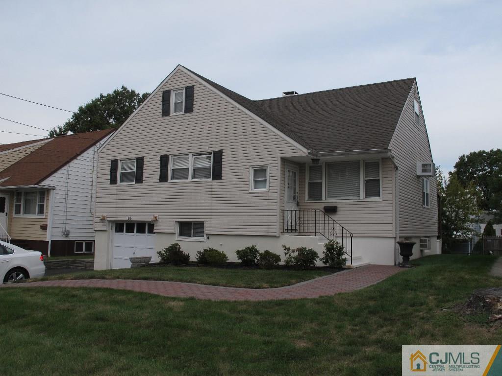 95 Brandywine Road Fords, NJ 08863 - Photo 1 of 23 a front view of a house with a yard