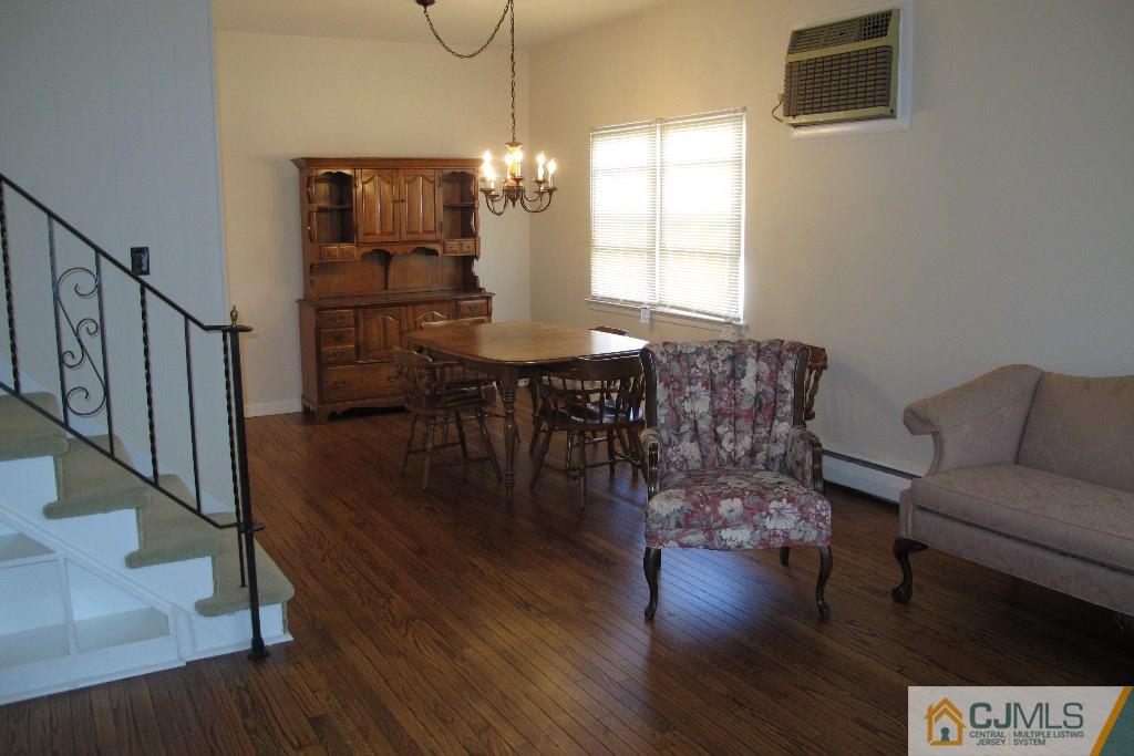 95 Brandywine Road Fords, NJ 08863 - Photo 2 of 23 a living room with furniture and a wooden floor