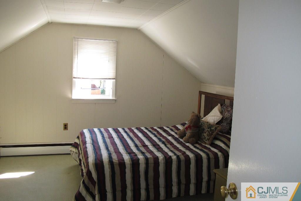 95 Brandywine Road Fords, NJ 08863 - Photo 12 of 23 a bedroom with a bed and a window