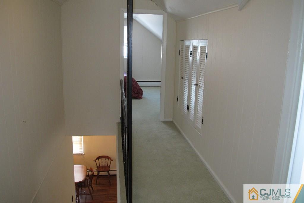 95 Brandywine Road Fords, NJ 08863 - Photo 14 of 23 a view of a hallway with a elevator