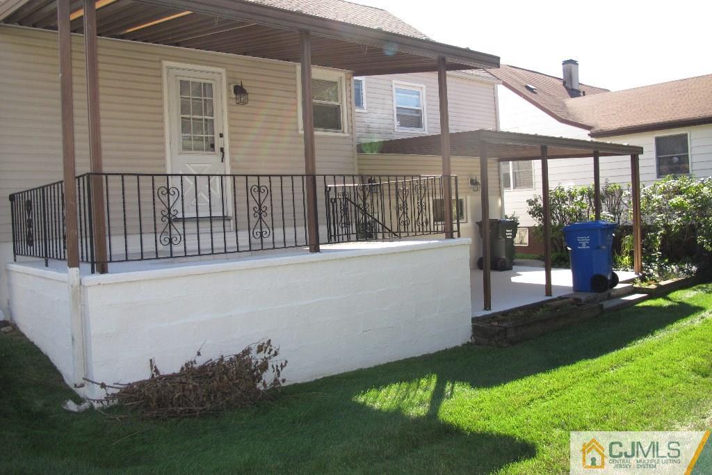 95 Brandywine Road Fords, NJ 08863 - Photo 16 of 23 a view of a house with backyard and sitting area