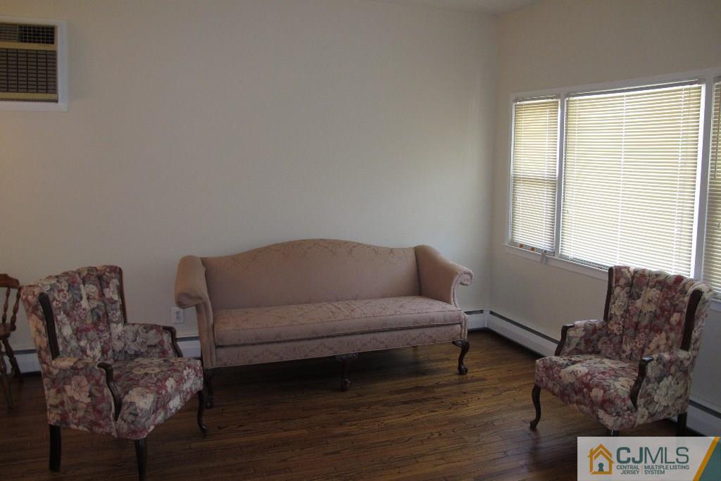 95 Brandywine Road Fords, NJ 08863 - Photo 3 of 23 a living room with furniture and a window