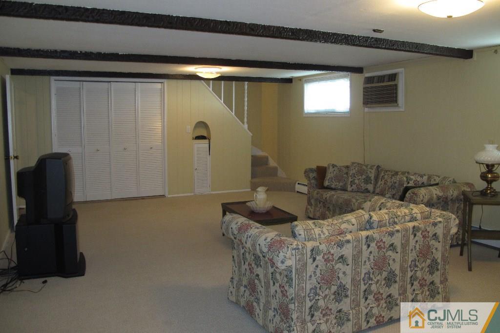 95 Brandywine Road Fords, NJ 08863 - Photo 8 of 23 a living room with furniture and a window