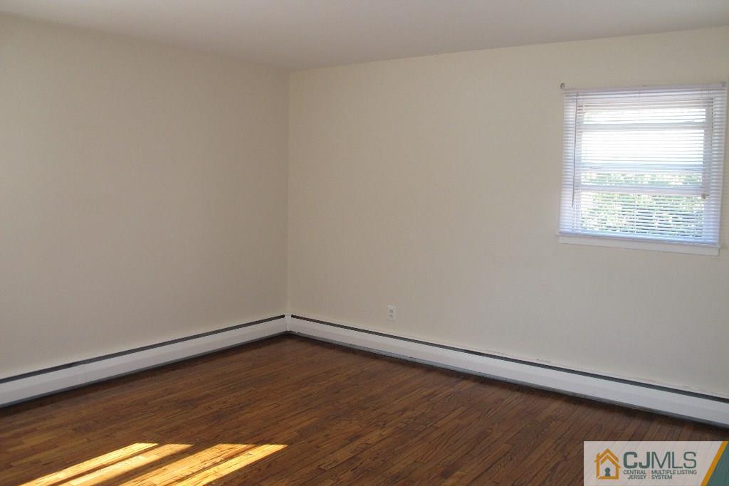 95 Brandywine Road Fords, NJ 08863 - Photo 9 of 23 a view of an empty room and window
