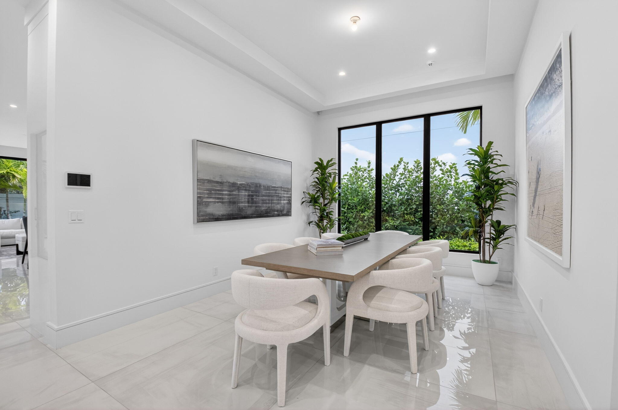2232 Delray Ridge Lane Delray Beach, FL 33444 - Photo 20 of 68 a dining room with furniture and a large window