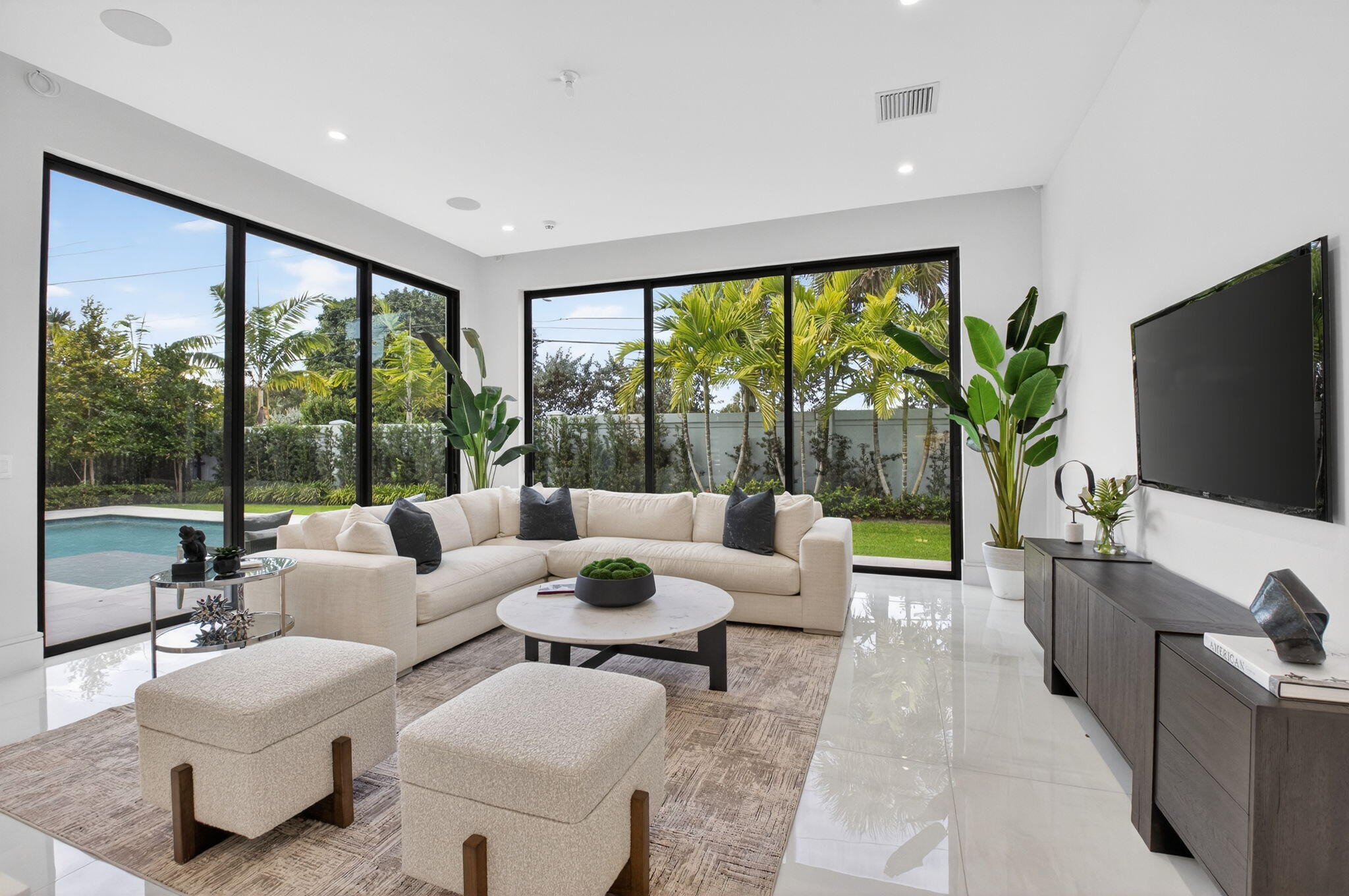 2232 Delray Ridge Lane Delray Beach, FL 33444 - Photo 23 of 68 a living room with furniture and a flat screen tv