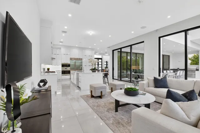 a bathroom with a sink toilet and mirror