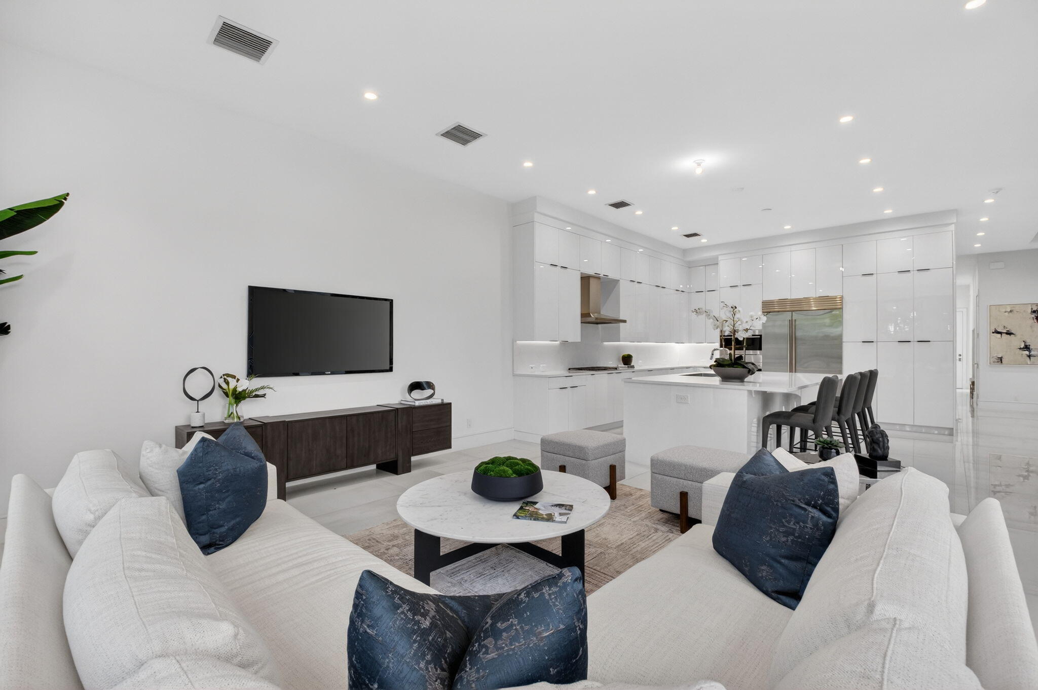 2232 Delray Ridge Lane Delray Beach, FL 33444 - Photo 25 of 68 a living room with furniture and a flat screen tv
