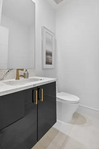 a bedroom with a large bed and a large window