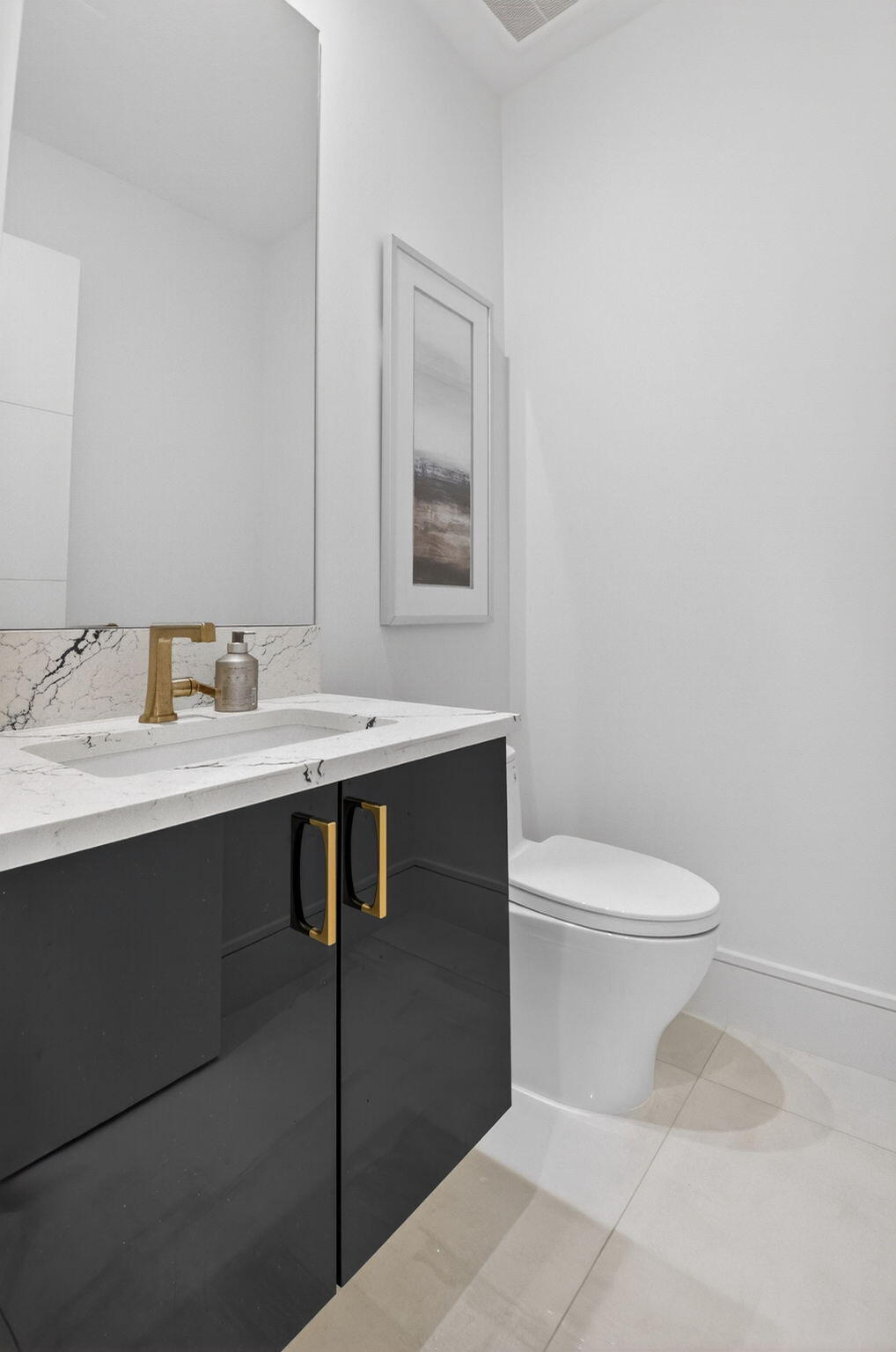 2232 Delray Ridge Lane Delray Beach, FL 33444 - Photo 33 of 68 a bathroom with a sink toilet and mirror