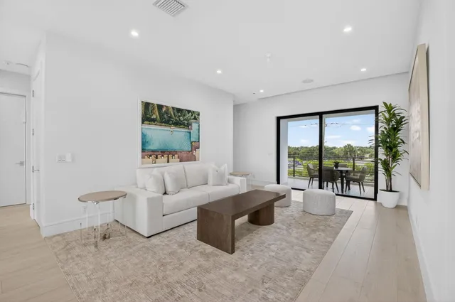 a large bathroom with a large tub and sink