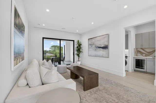 a spacious bathroom with a double vanity sink and a mirror