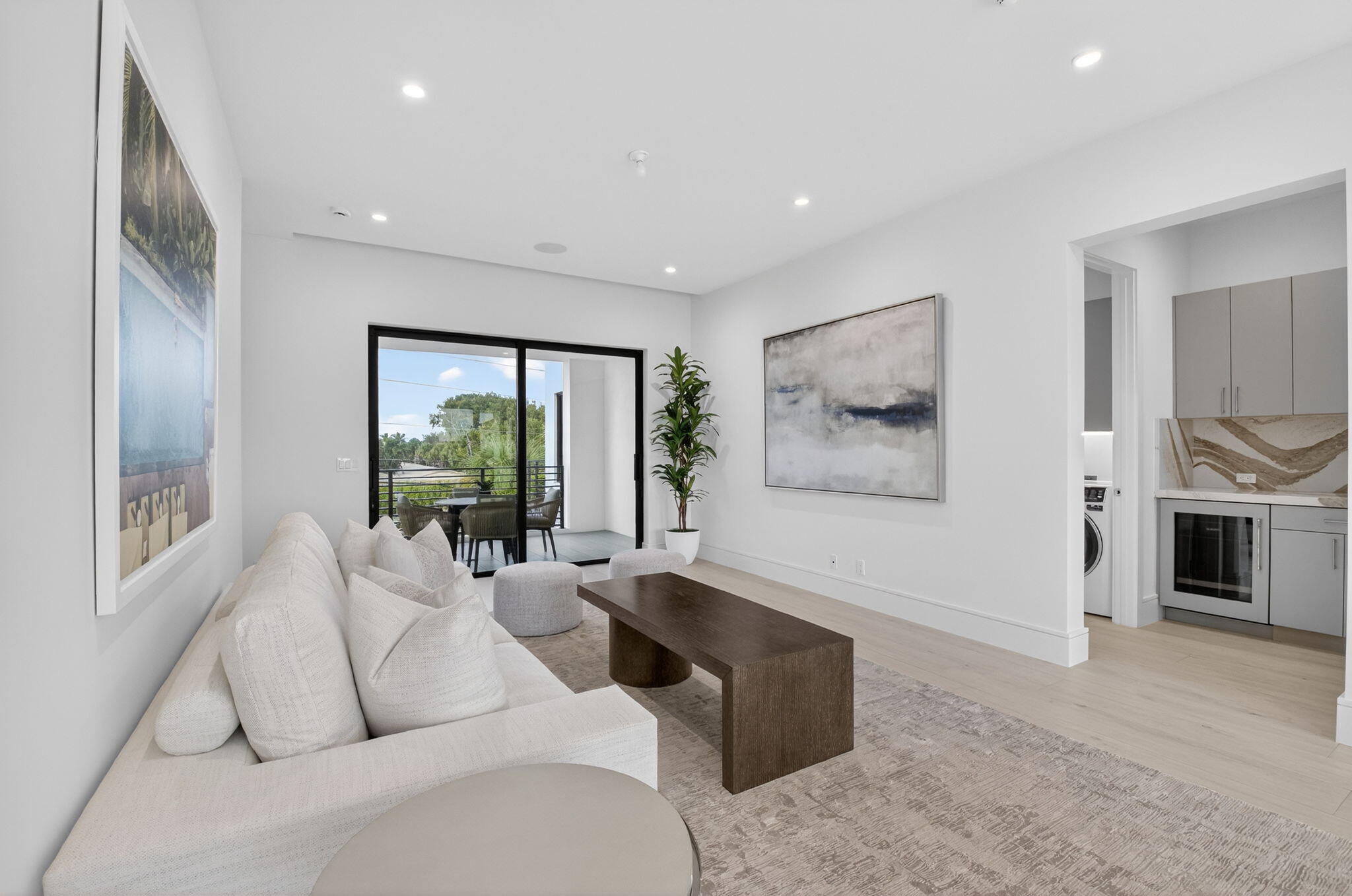 2232 Delray Ridge Lane Delray Beach, FL 33444 - Photo 40 of 68 a living room with furniture large window and a fireplace