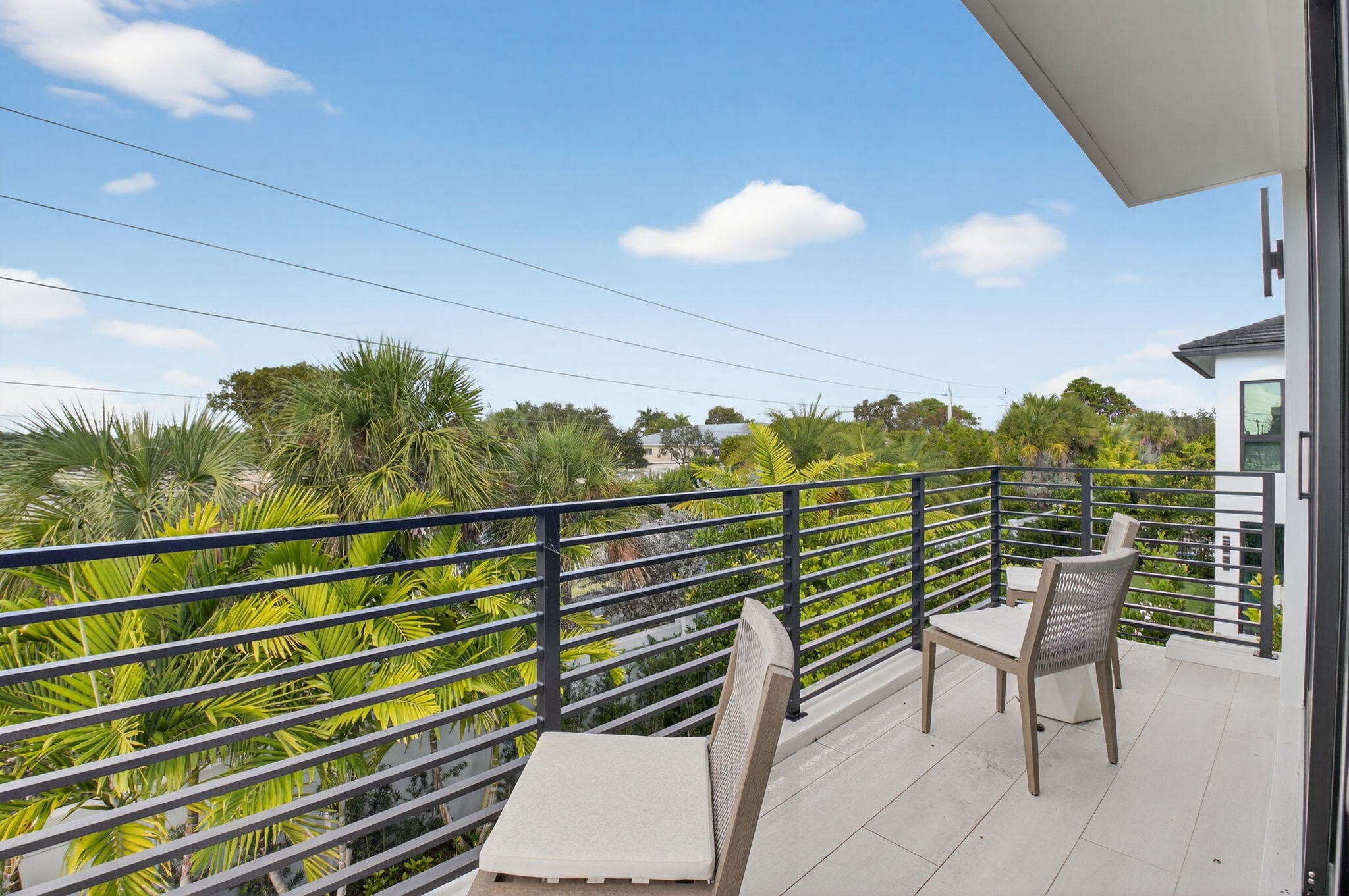 2232 Delray Ridge Lane Delray Beach, FL 33444 - Photo 49 of 68 a view of a chairs and table in the balcony