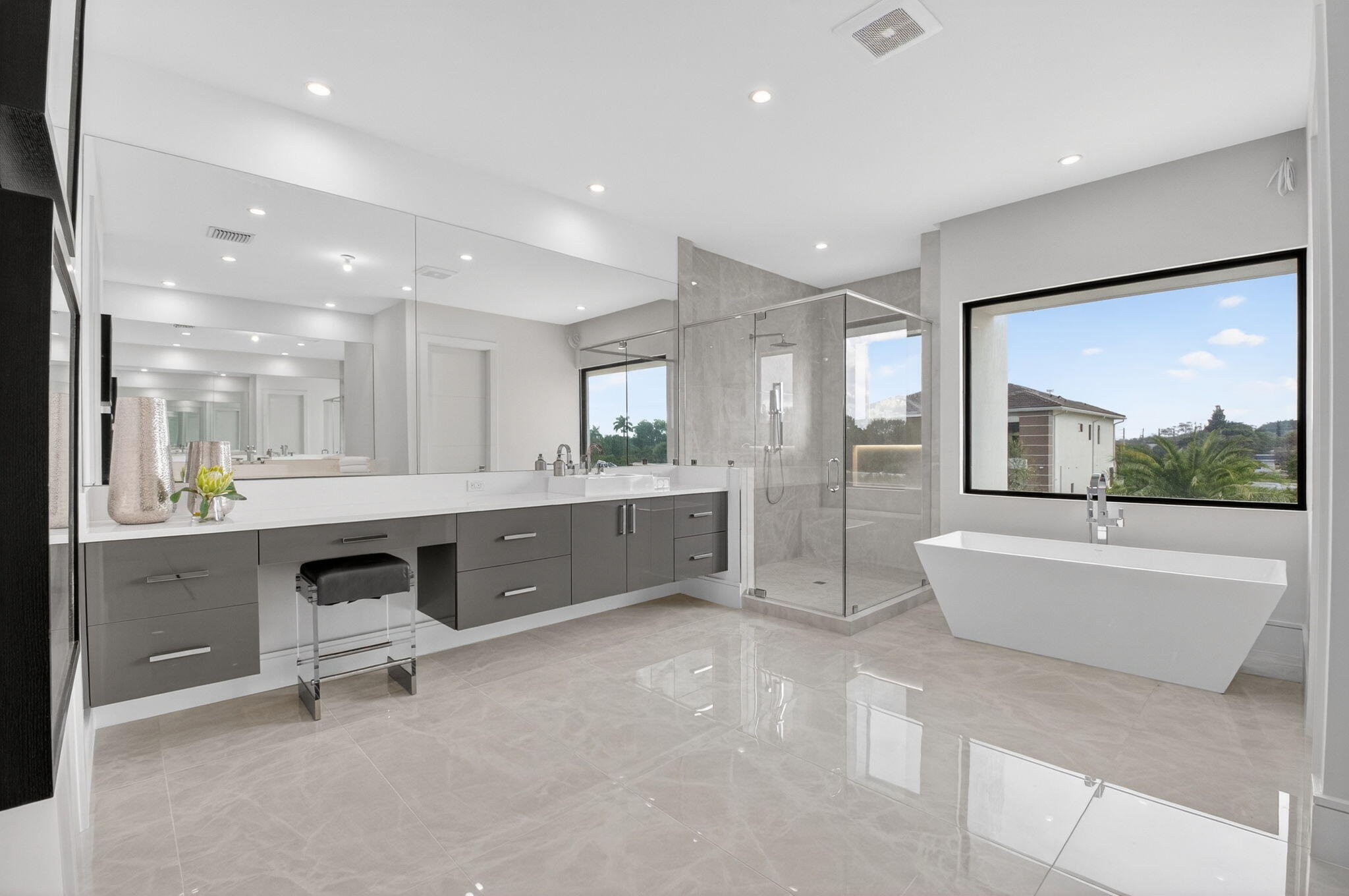 2232 Delray Ridge Lane Delray Beach, FL 33444 - Photo 52 of 68 a large bathroom with a large tub and sink