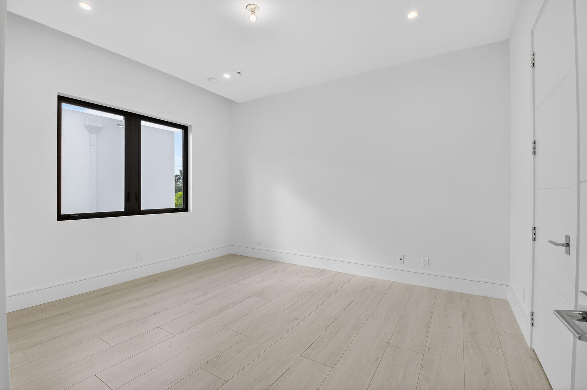 2232 Delray Ridge Lane Delray Beach, FL 33444 - Photo 55 of 68 an empty room with a window