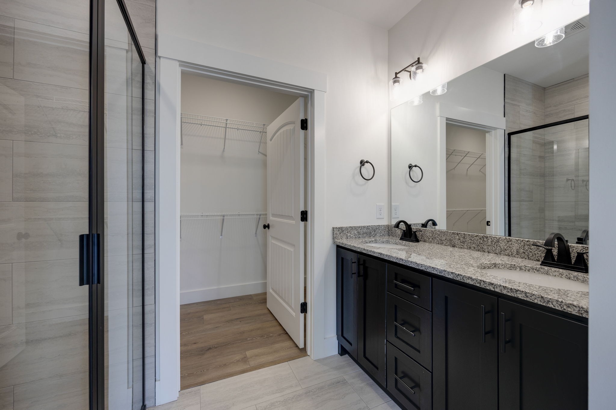2175 Rylee Way Greenbrier, TN 37073 - Photo 11 of 19 a bathroom with a double vanity sink and mirror