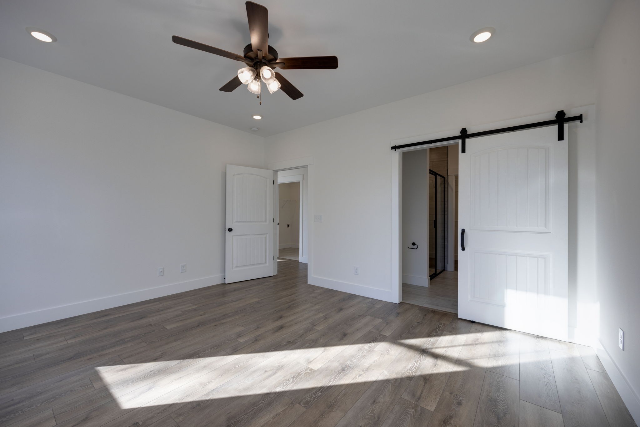 2175 Rylee Way Greenbrier, TN 37073 - Photo 10 of 19 a view of an empty room with wooden floor