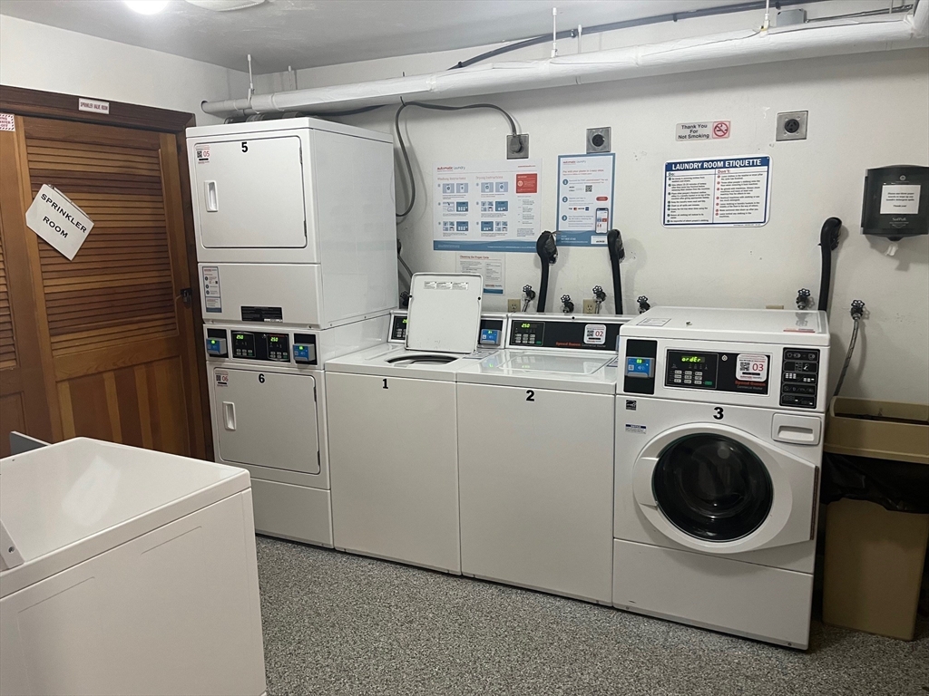 71 Edgeworth Street, Unit 21 Worcester, MA 01605 - Photo 13 of 14 a utility room with dryer and washer