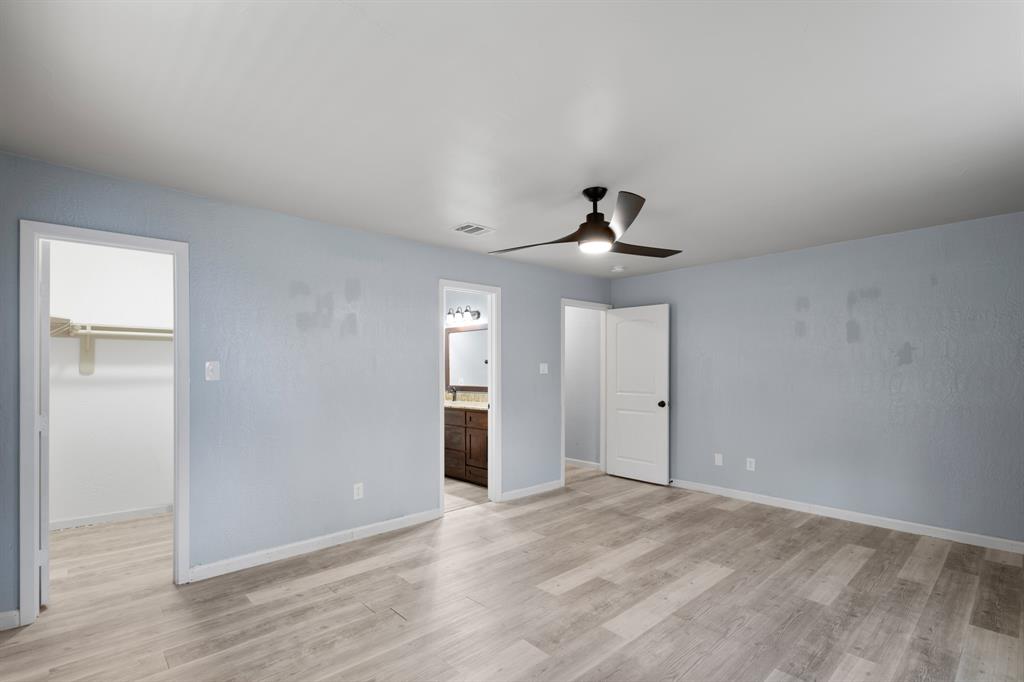 202 Blocker Bridgeport, TX 76426 - Photo 23 of 27 a view of an empty room and wooden floor