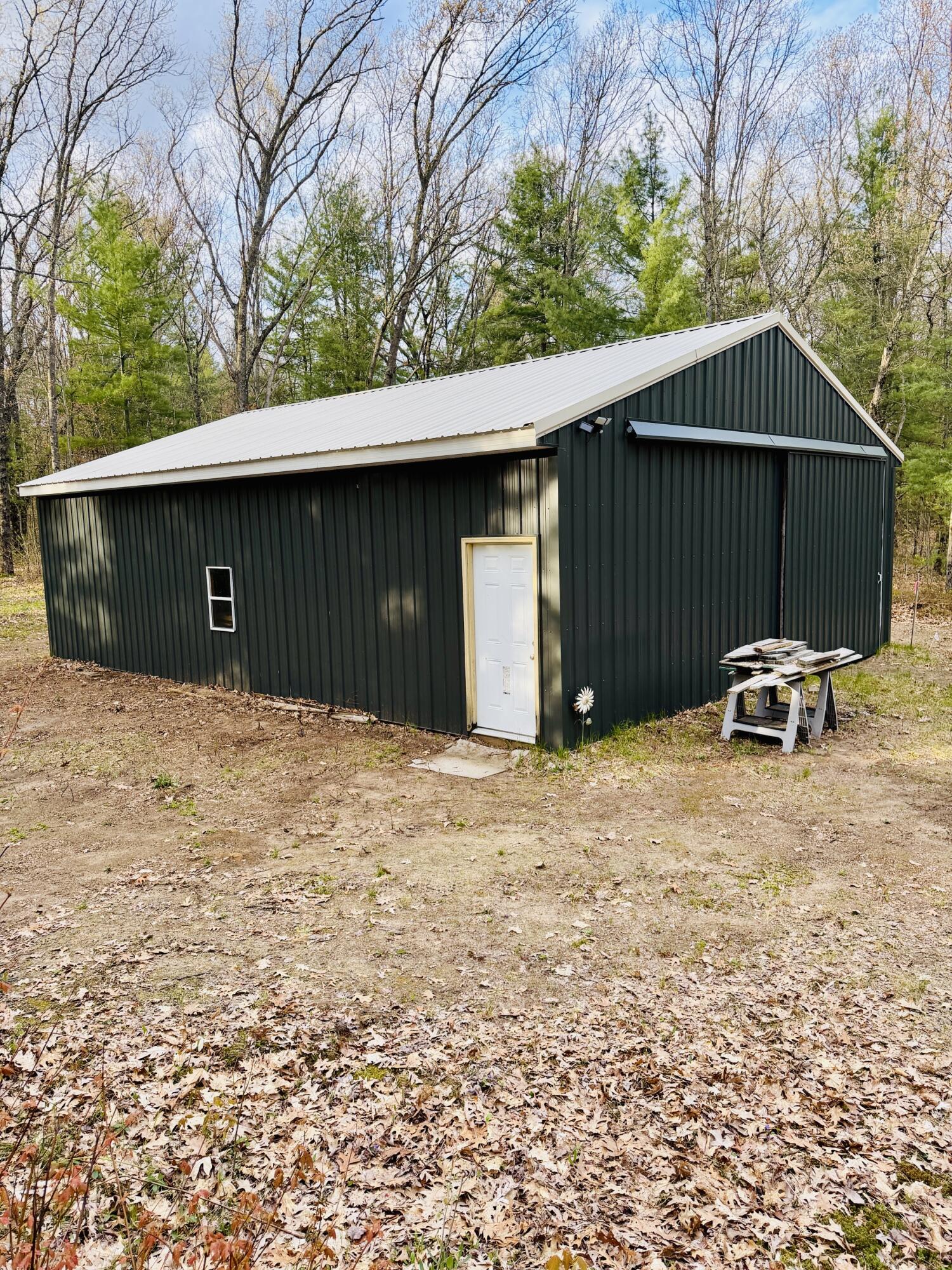 1661 North Centerline Road White Cloud, MI 49349 - Photo 1 of 45 IMG_0345