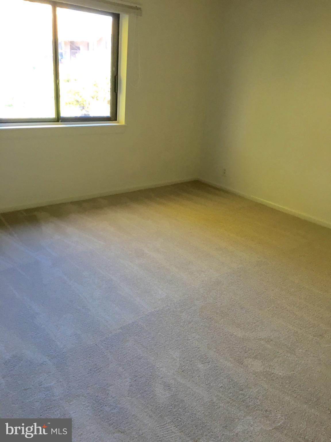 6260 Edsall Road, Unit 401 Alexandria, VA 22312 - Photo 21 of 30 an empty room with a window