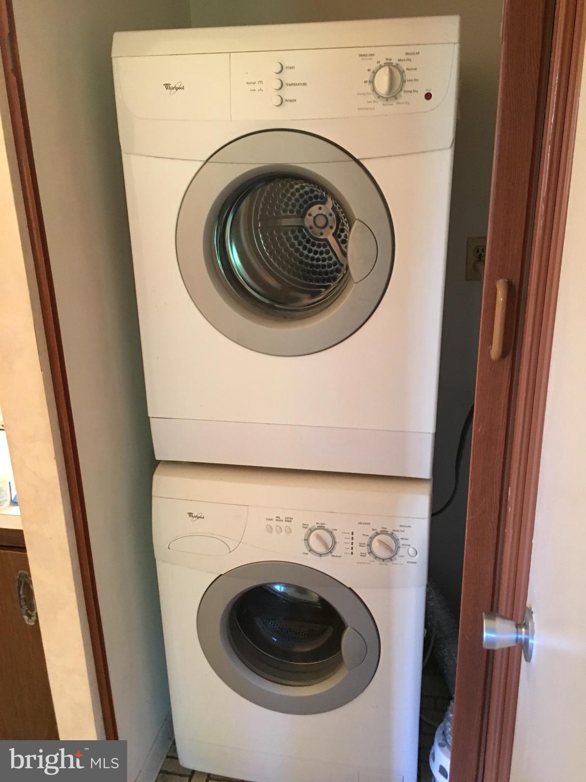 6260 Edsall Road, Unit 401 Alexandria, VA 22312 - Photo 7 of 30 a utility room with dryer and washer