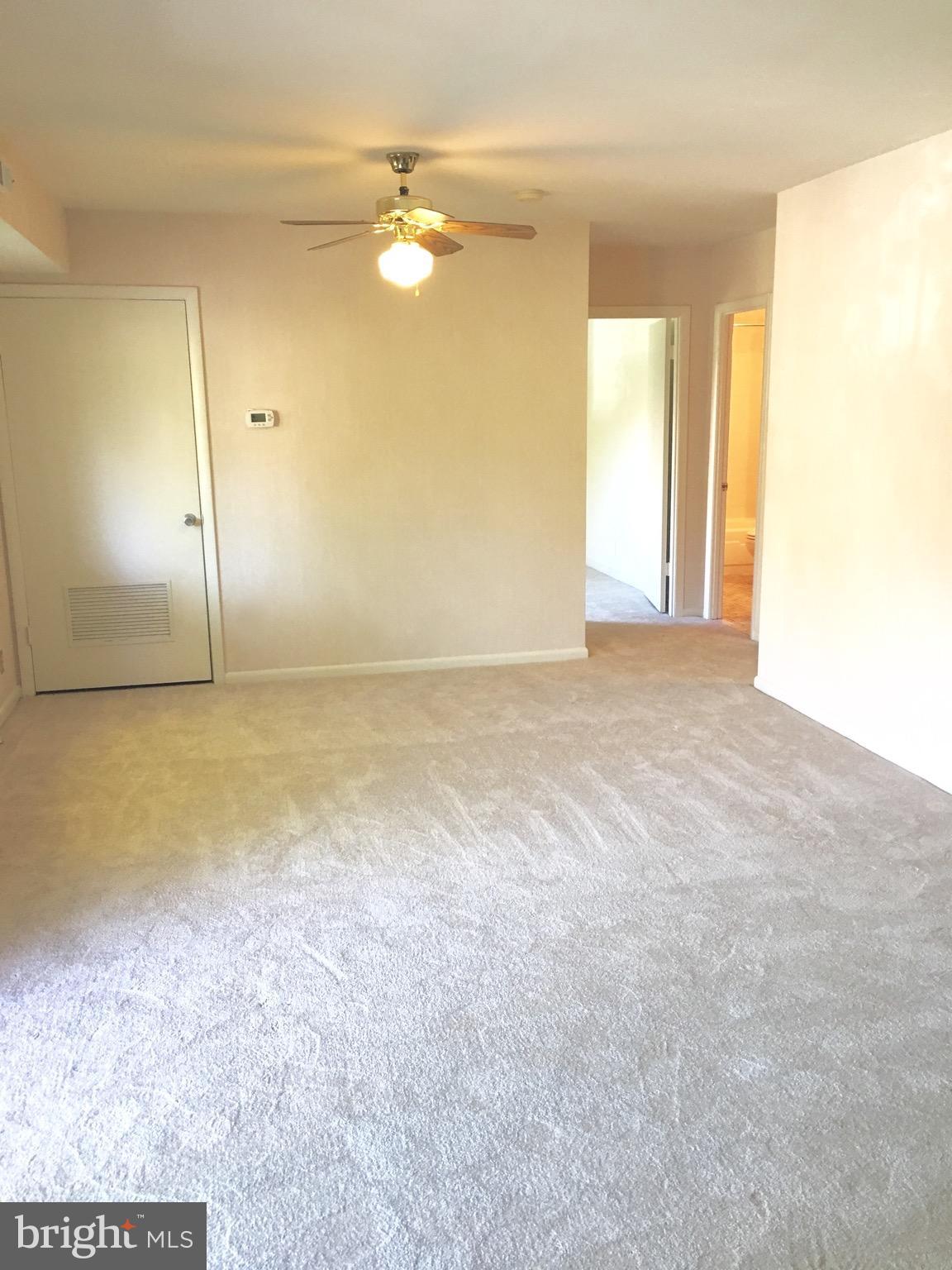 6260 Edsall Road, Unit 401 Alexandria, VA 22312 - Photo 9 of 30 a view of an empty room with a window