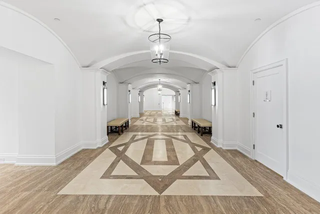 a park view with a bench and city view