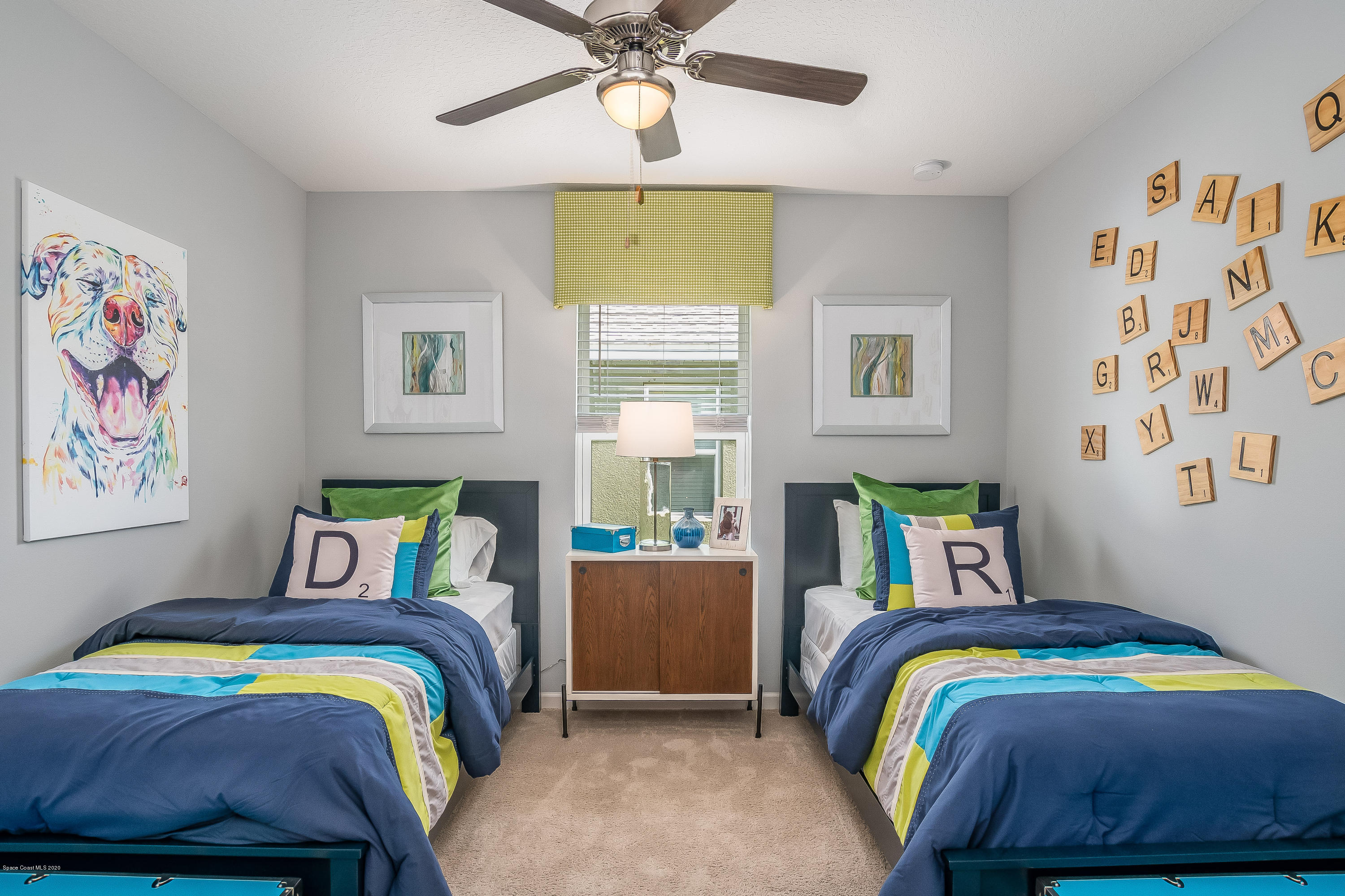 3873 Sandhill Crane Circle Mims, FL 32754 - Photo 16 of 32 a bedroom with a bed and window